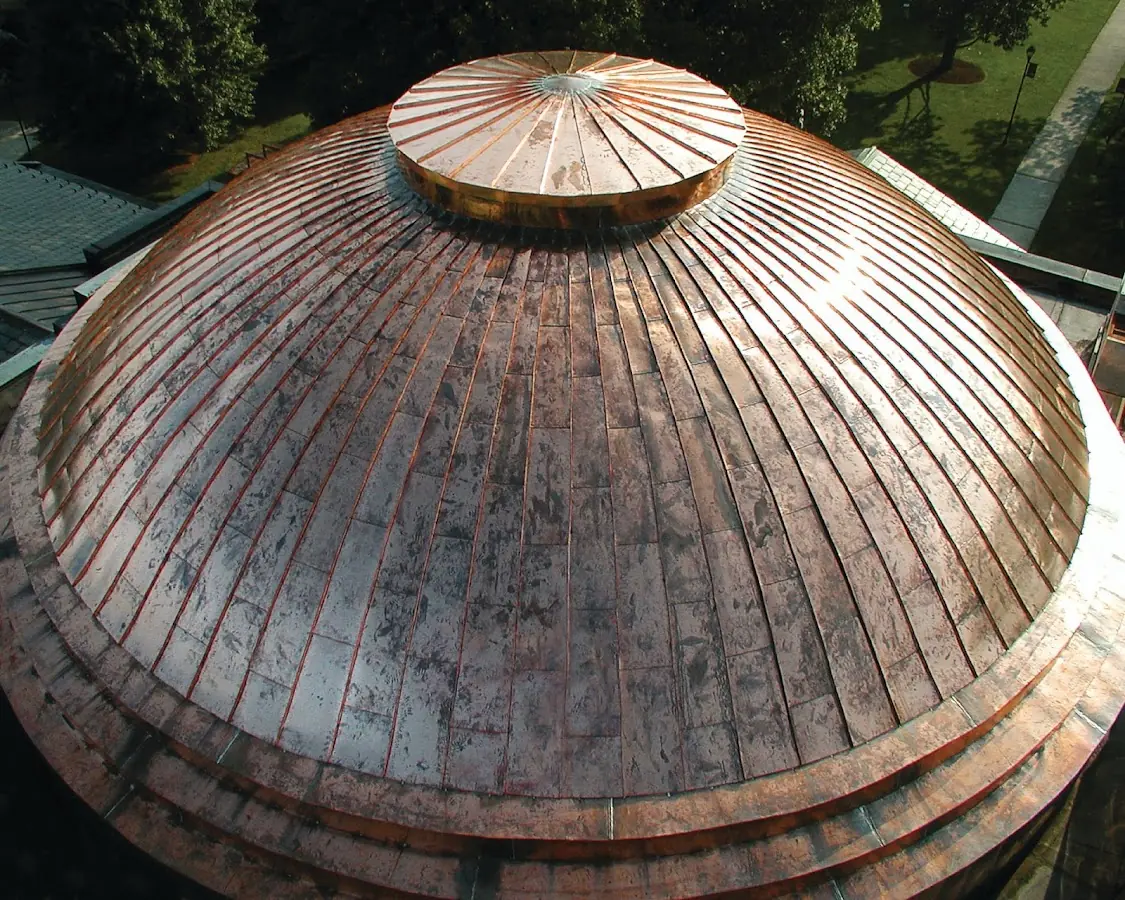 Craftsman Roofing crew installing a new roof in Milford